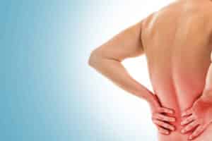 Back view of a shirtless person clutching their abdomen, suggesting belly pain, with a blue gradient background.