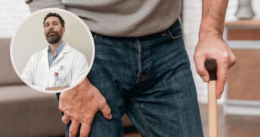 Man using a wooden cane for support, wearing jeans; circular inset shows a doctor in a white coat